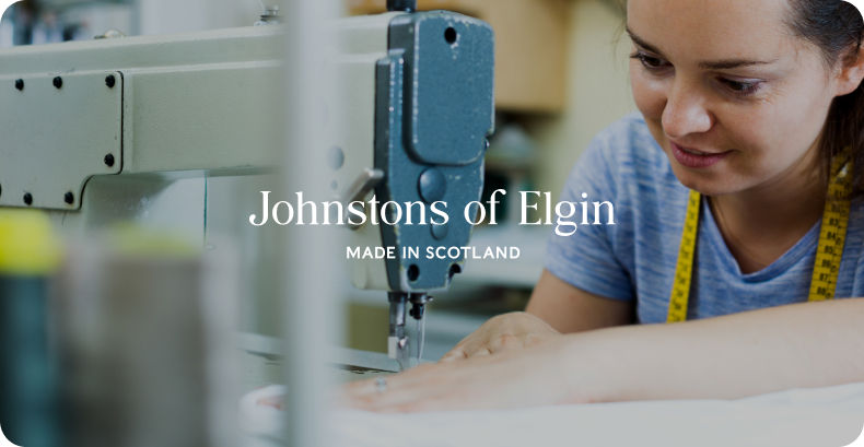 Sewing machine with johnstons of elgin logo overlay