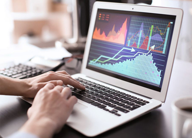 laptop screen showing line graph