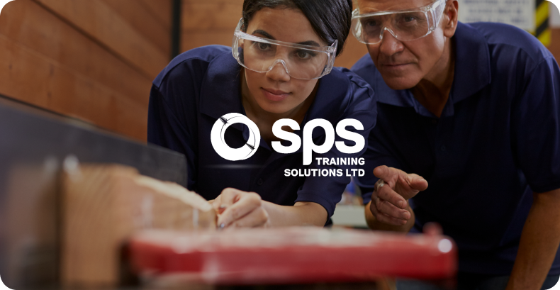 Apprentice being observed by trainer with SPS training solutions logo overlay