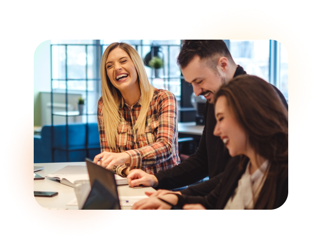 Team of 3 colleagues laughing together